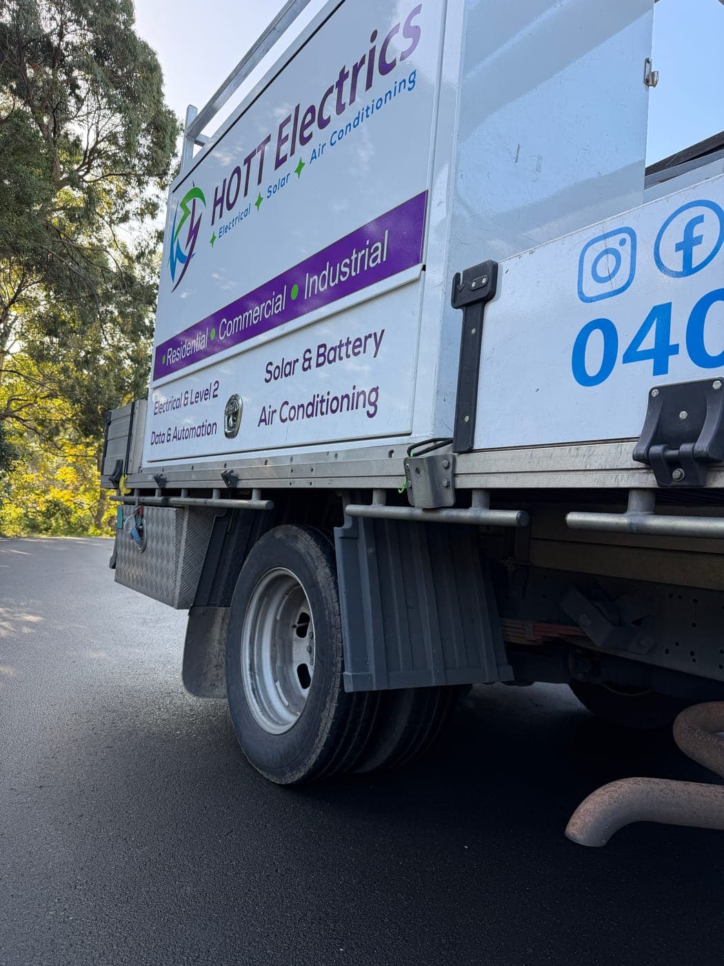 Worn rear tyre on a fleet work truck before replacement in Austinmer