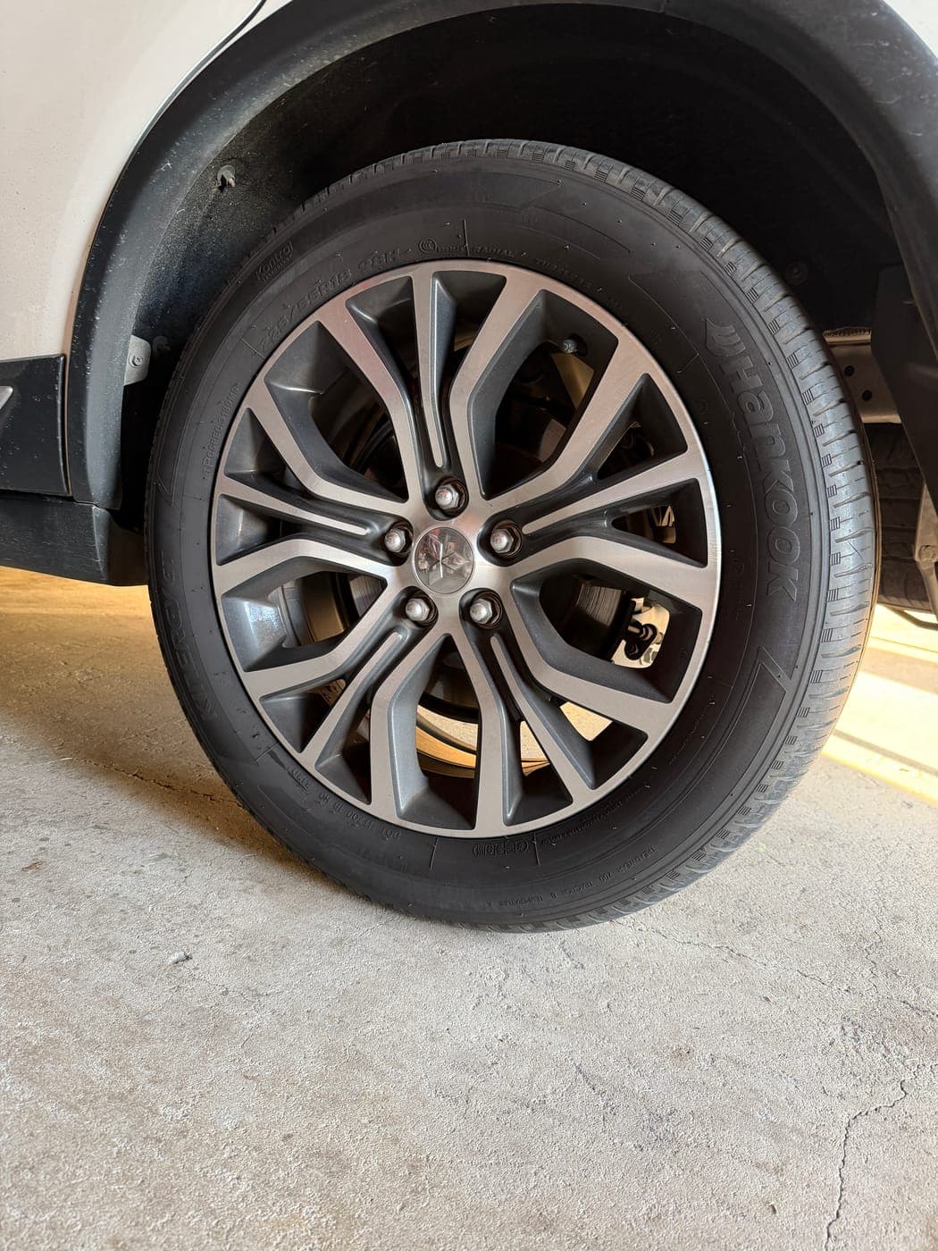 Punctured Mitsubishi ASX tyre before replacement in Camden South