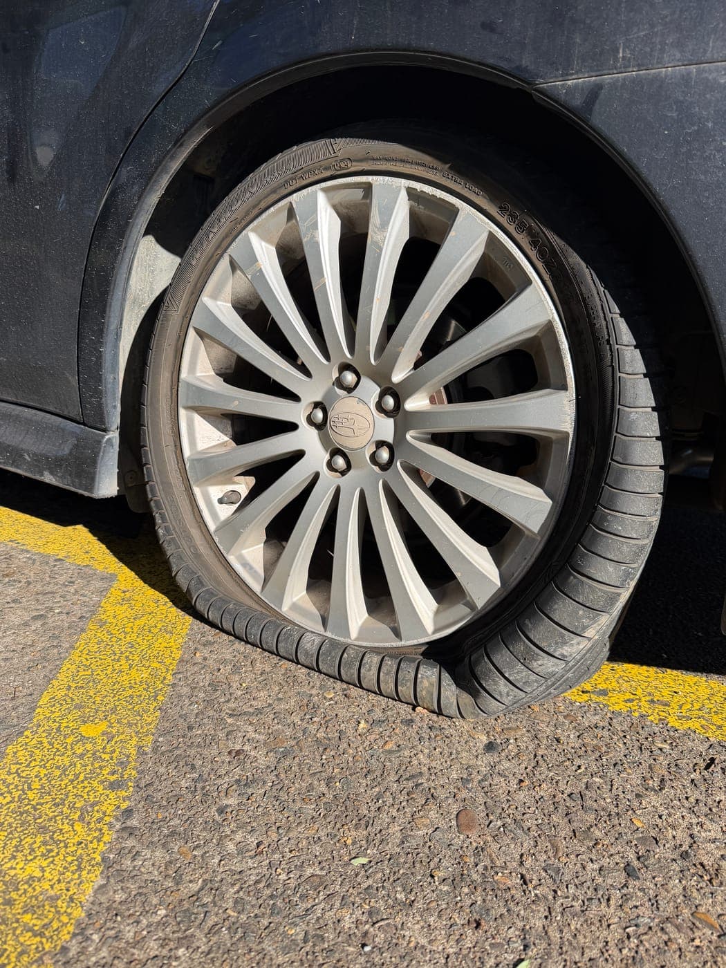 Subaru tyre destroyed after being driven flat on Blaxland Road, Campbelltown, before replacement