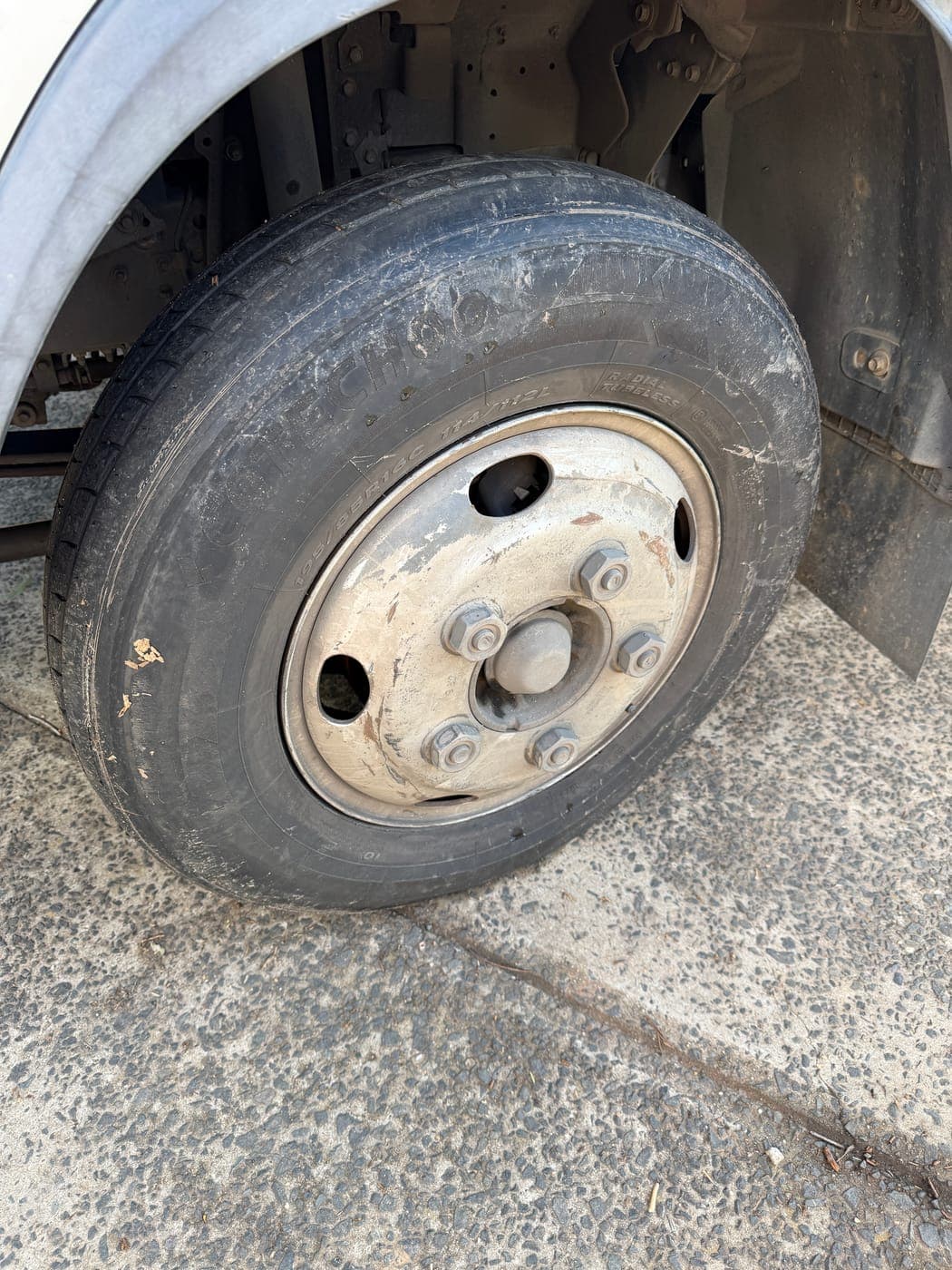 Completely worn truck tyre before replacement in Campbelltown