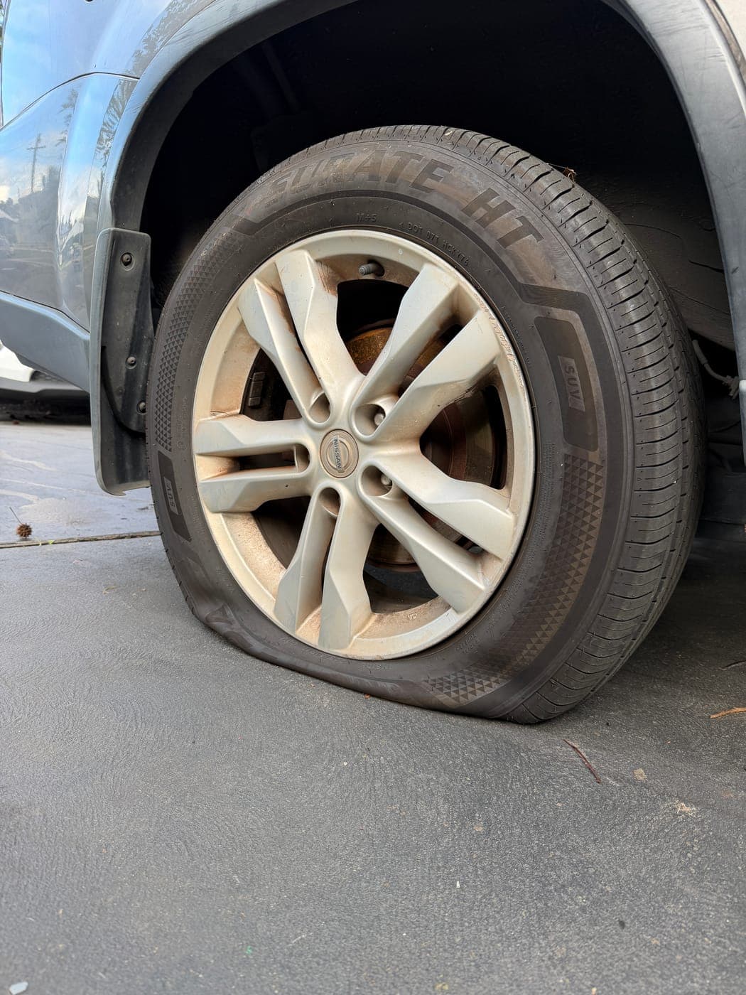 Punctured Nissan X-Trail tyre before repair in Fairfield West