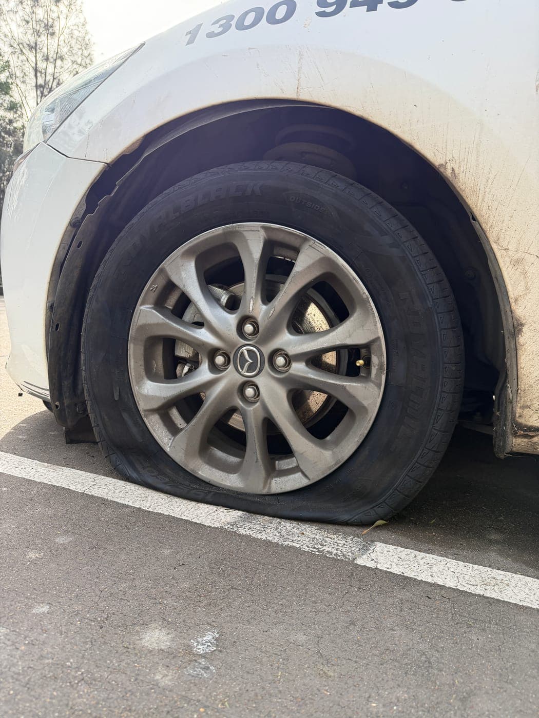 Worn, blown-out Mazda 3 tyre before replacement in Harrington Park