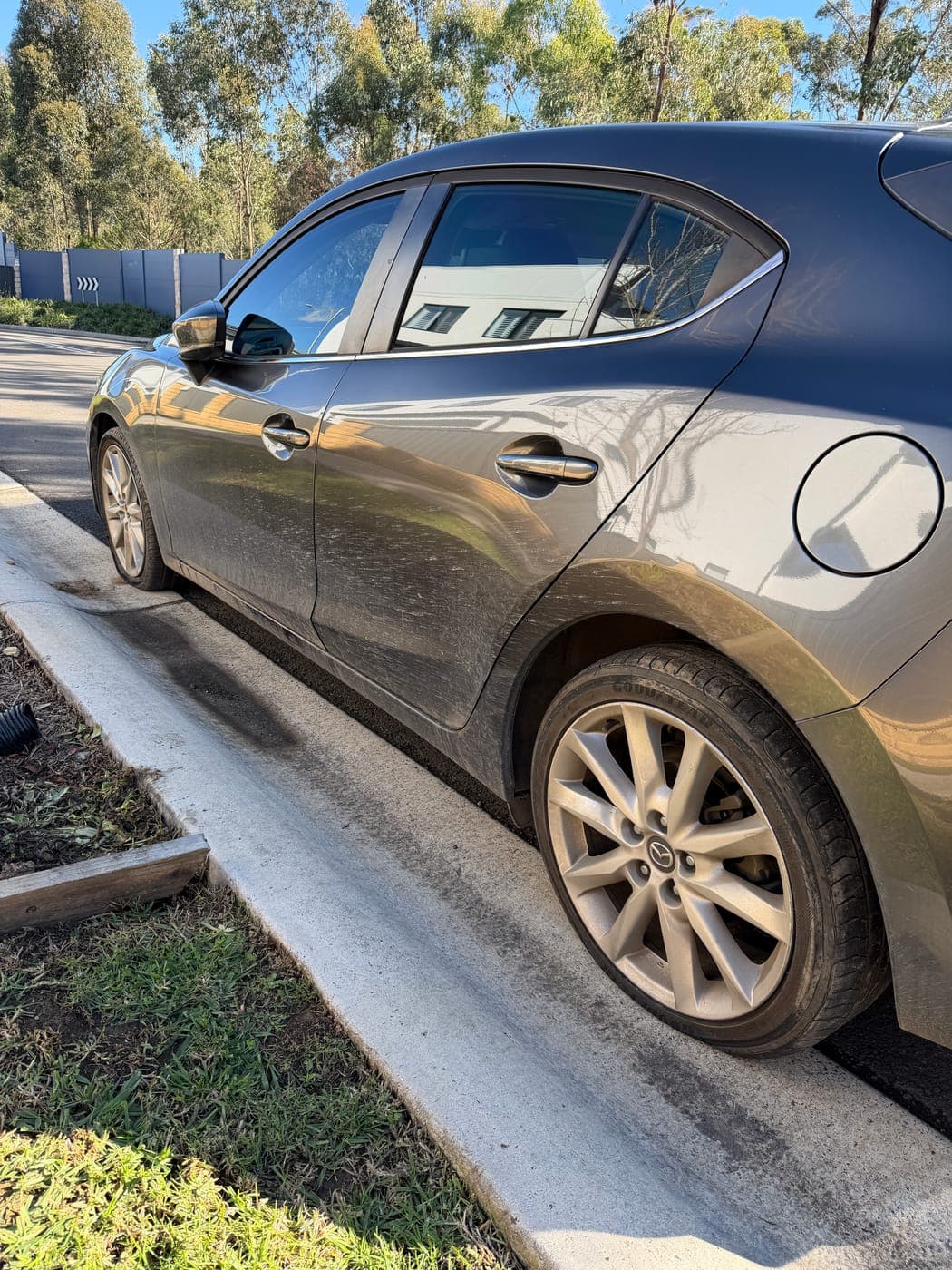 Mazda 3 wheel and tyre damaged by a pothole before replacement in Leppington