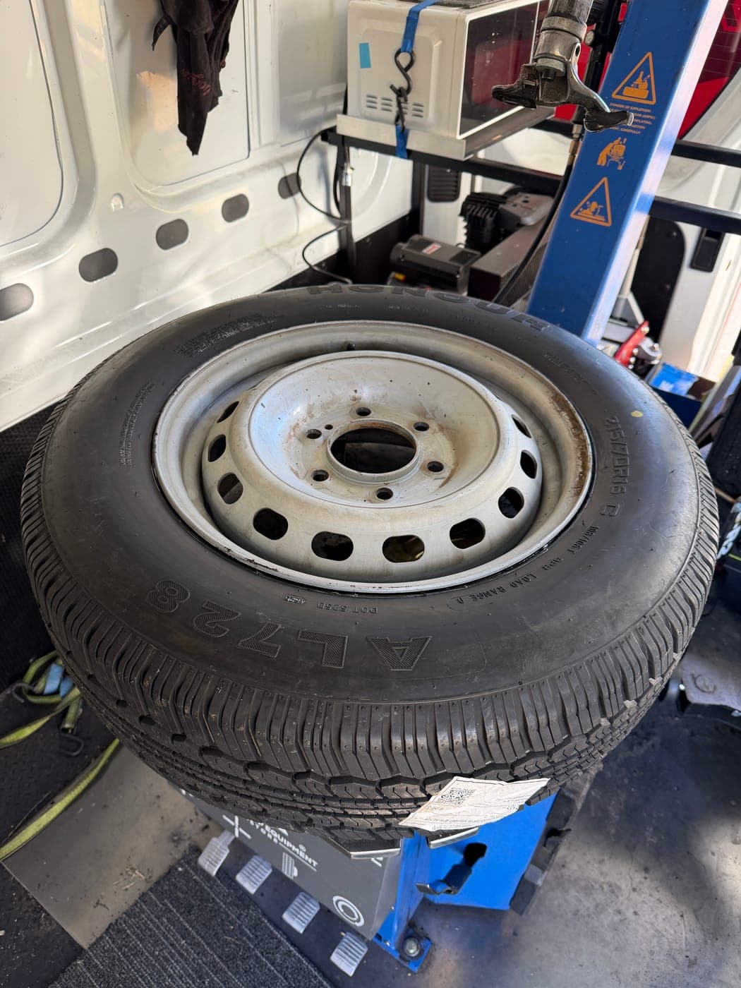 New tyre fitted to a Hyundai iLoad commercial van in Luddenham by Top Tier Mobile Tyres