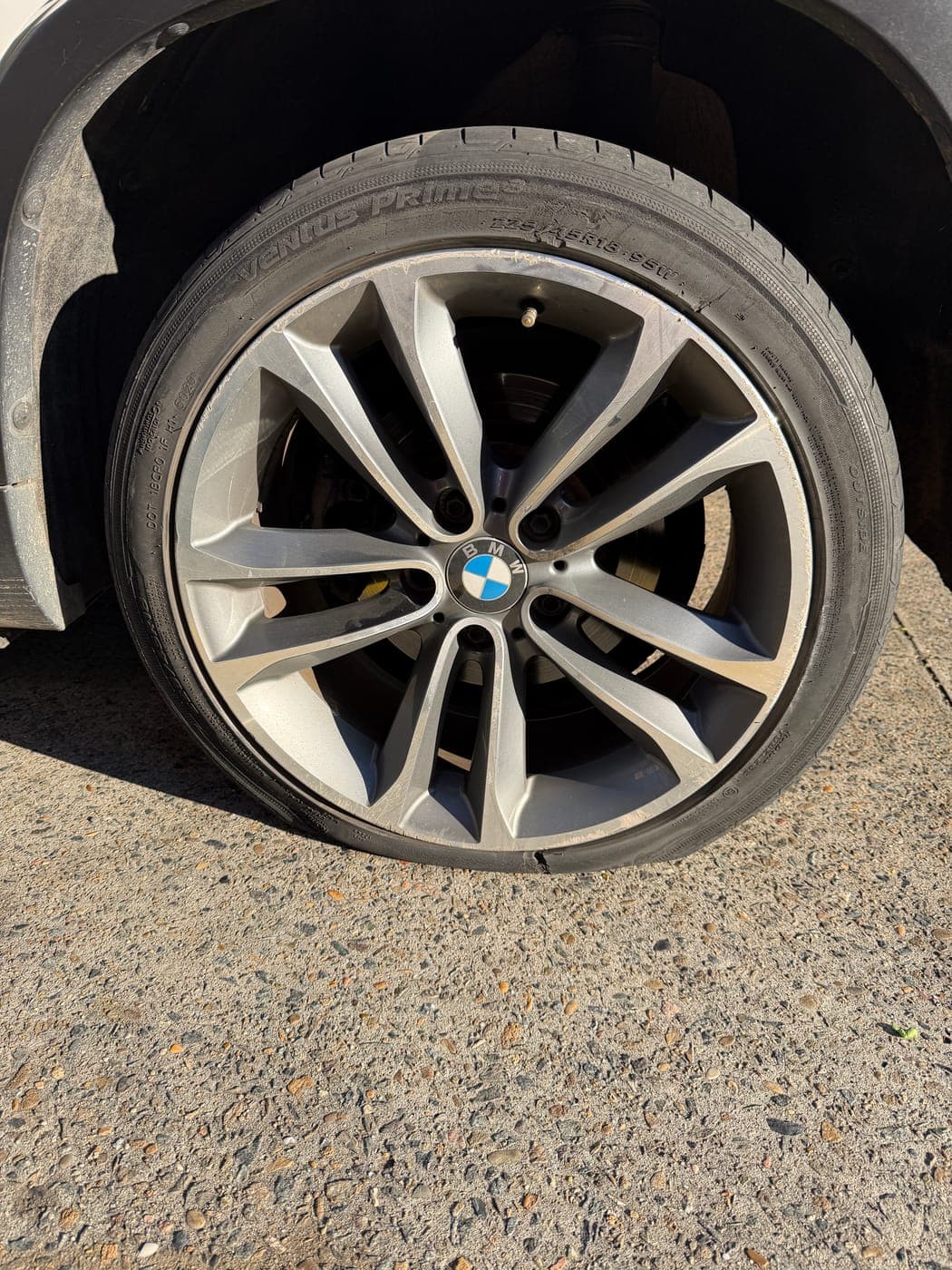 BMW tyre with a blown sidewall before replacement in Minto