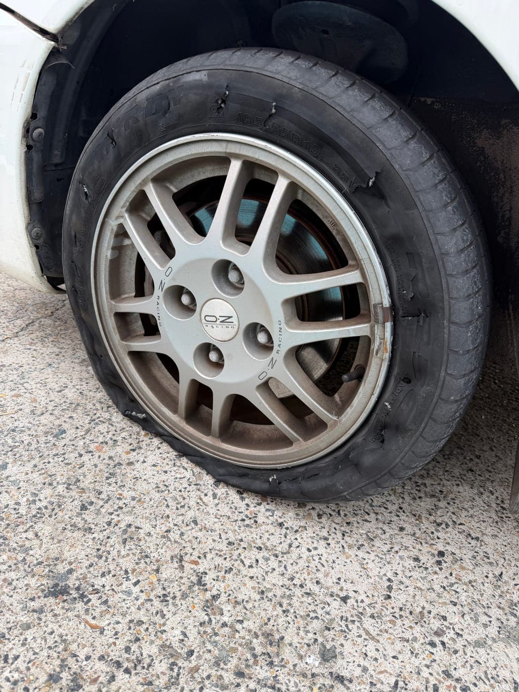 Mitsubishi Lancer tyre destroyed after being driven flat on a puncture in Mount Annan