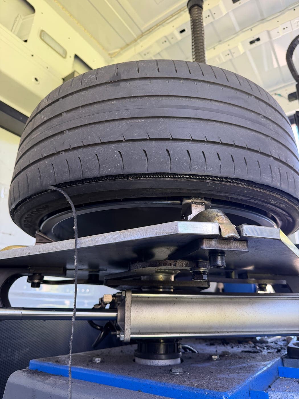 BMW tyre worn through to the canvas and shredding before replacement in Oran Park
