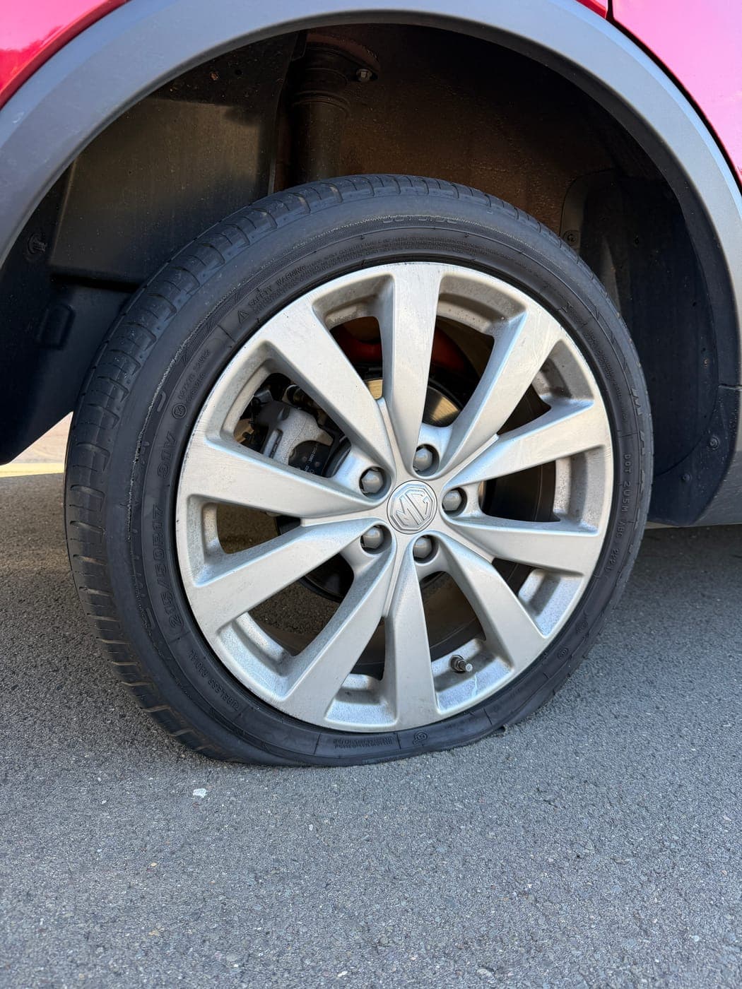 MG tyre destroyed after being driven flat on a puncture in Oran Park