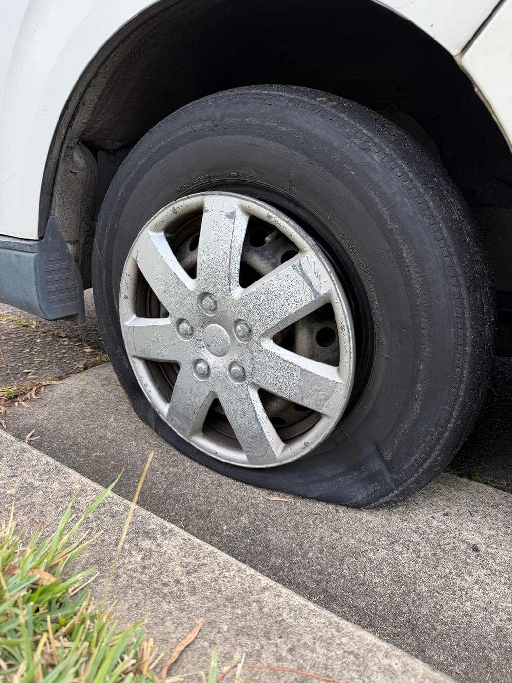 Toyota HiAce van tyre destroyed after being driven flat on a puncture in Seven Hills
