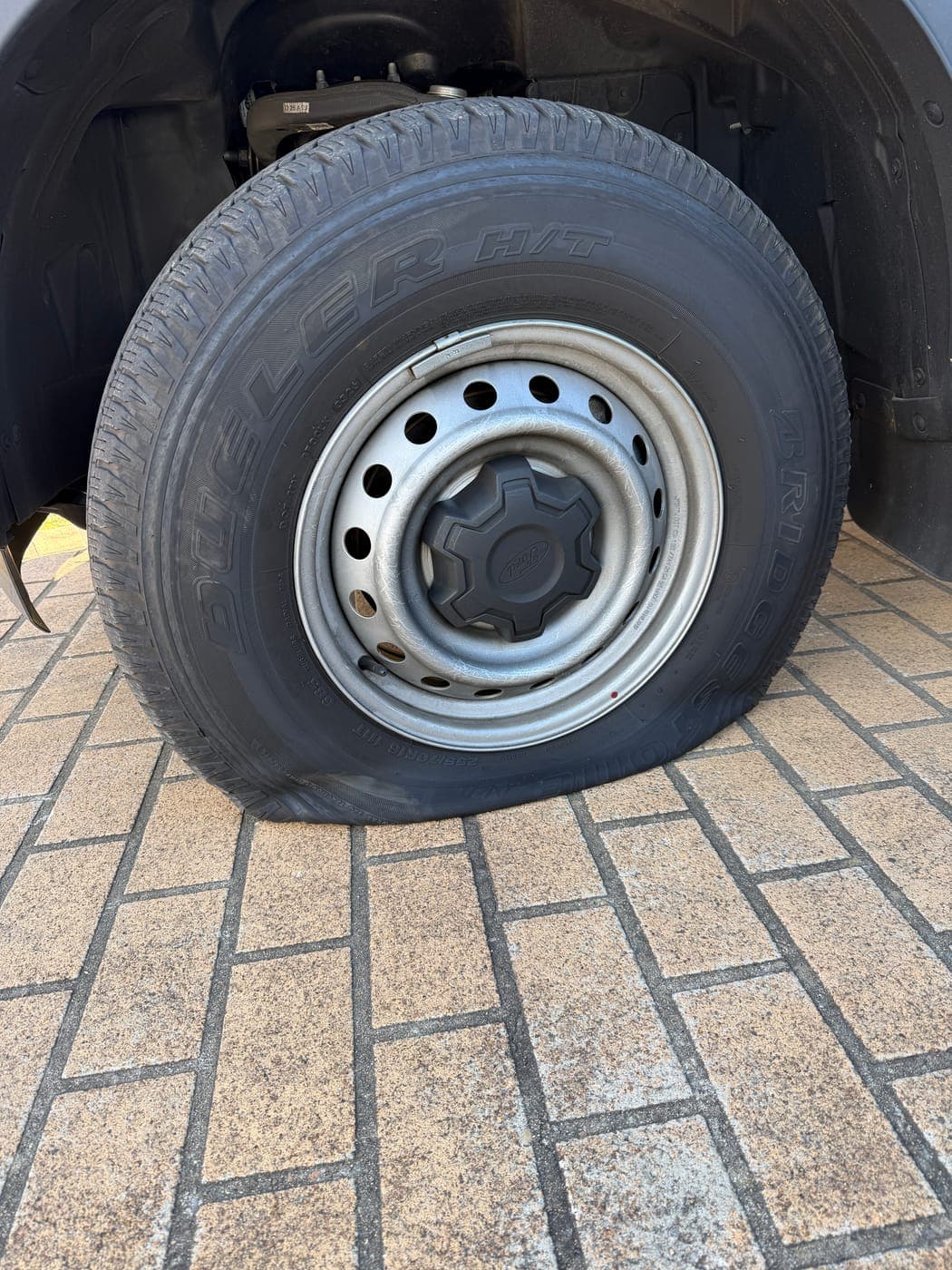 Punctured Ford Ranger tyre before an on-site repair in St Helens Park