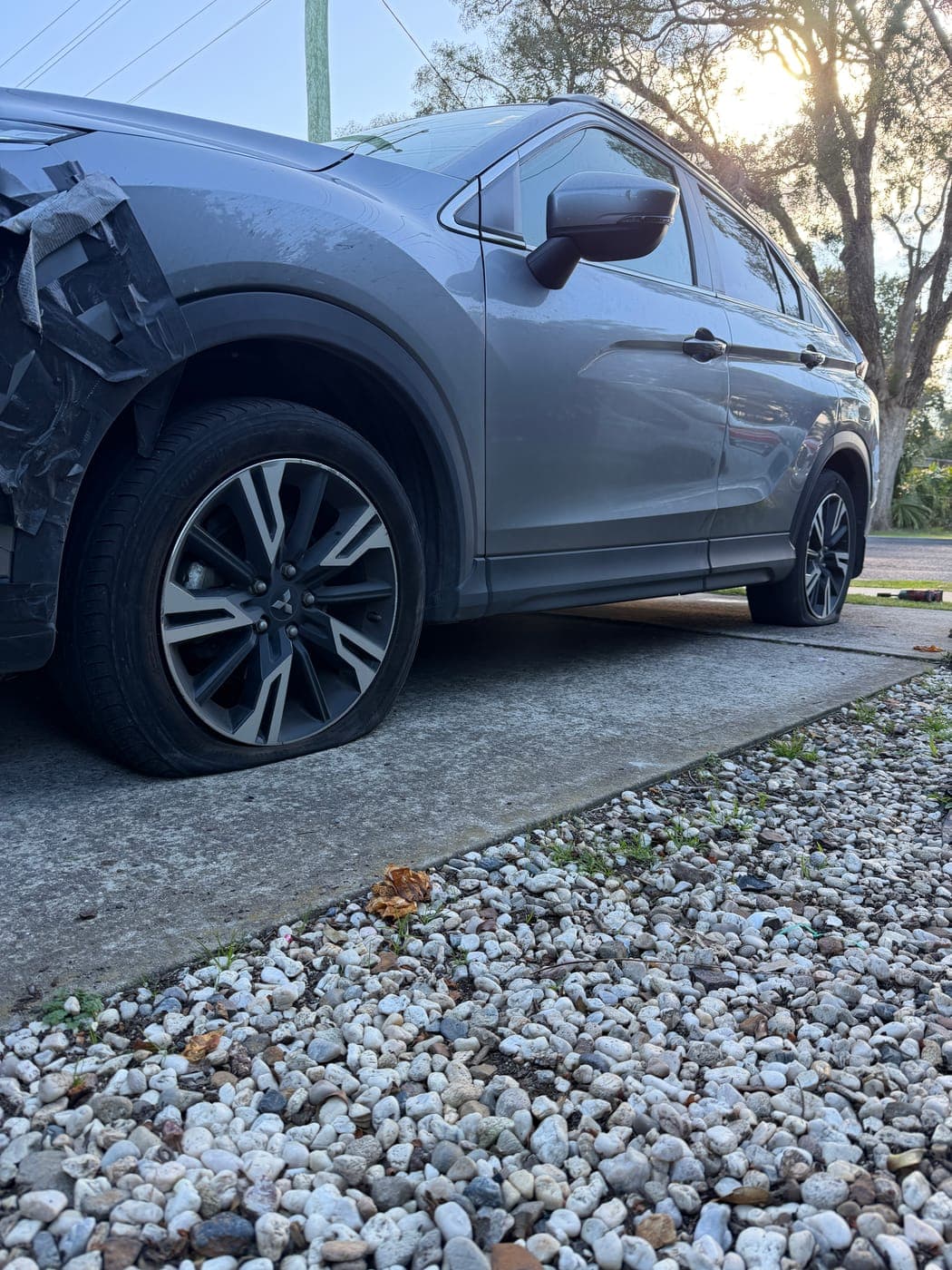 Mitsubishi Eclipse Cross tyre damaged by a kerb strike before replacement in Thirlmere