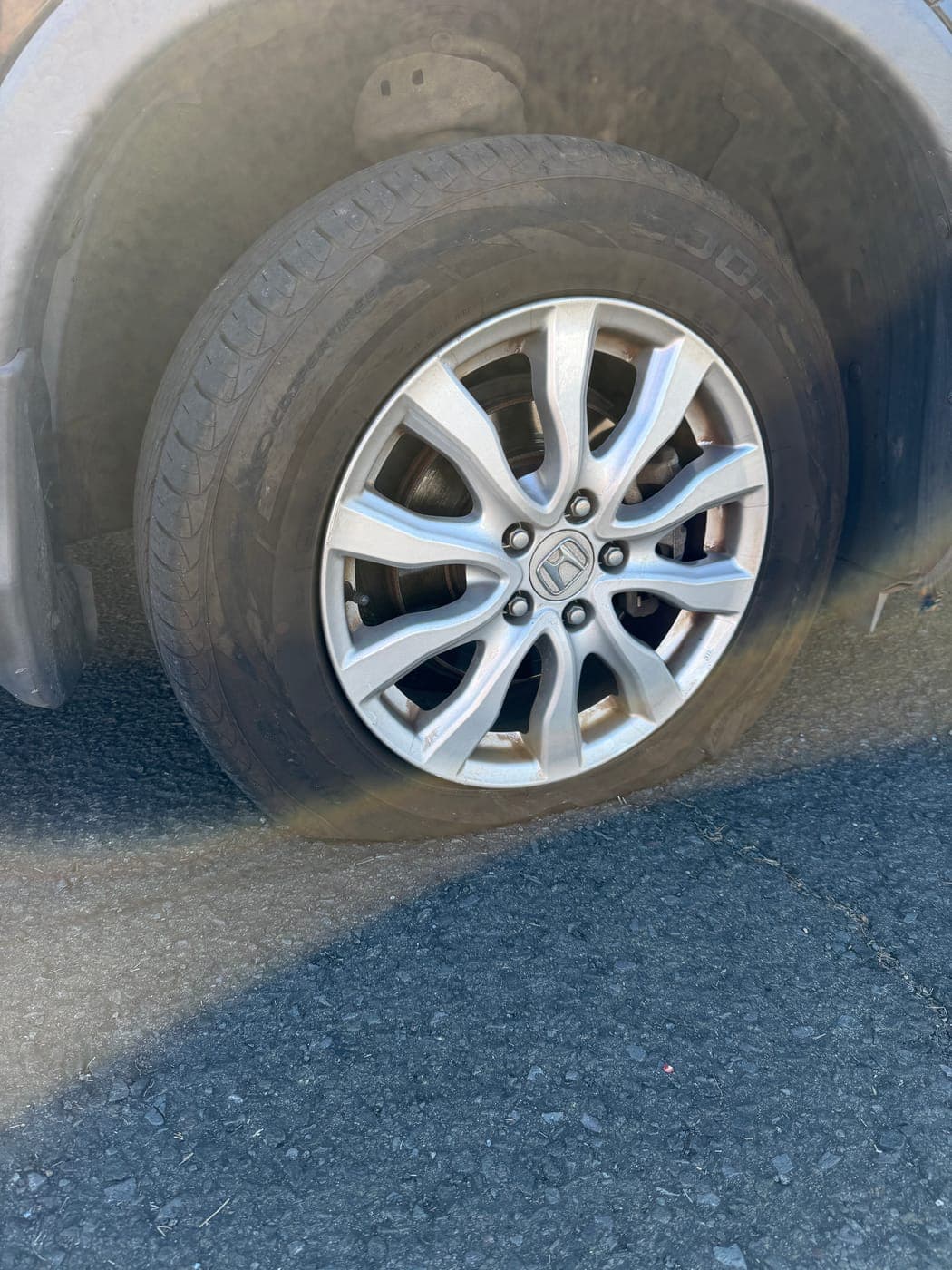 Honda CR-V tyre blown by a kerb strike before replacement in Towradgi