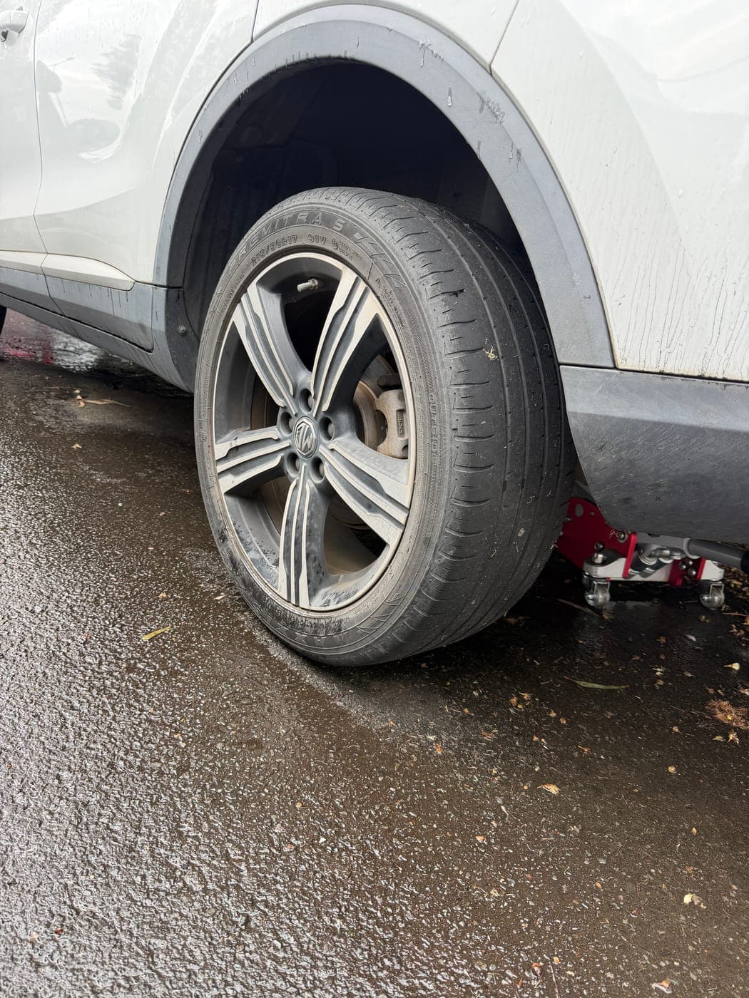 Worn-out tyre on an MG before replacement in Villawood