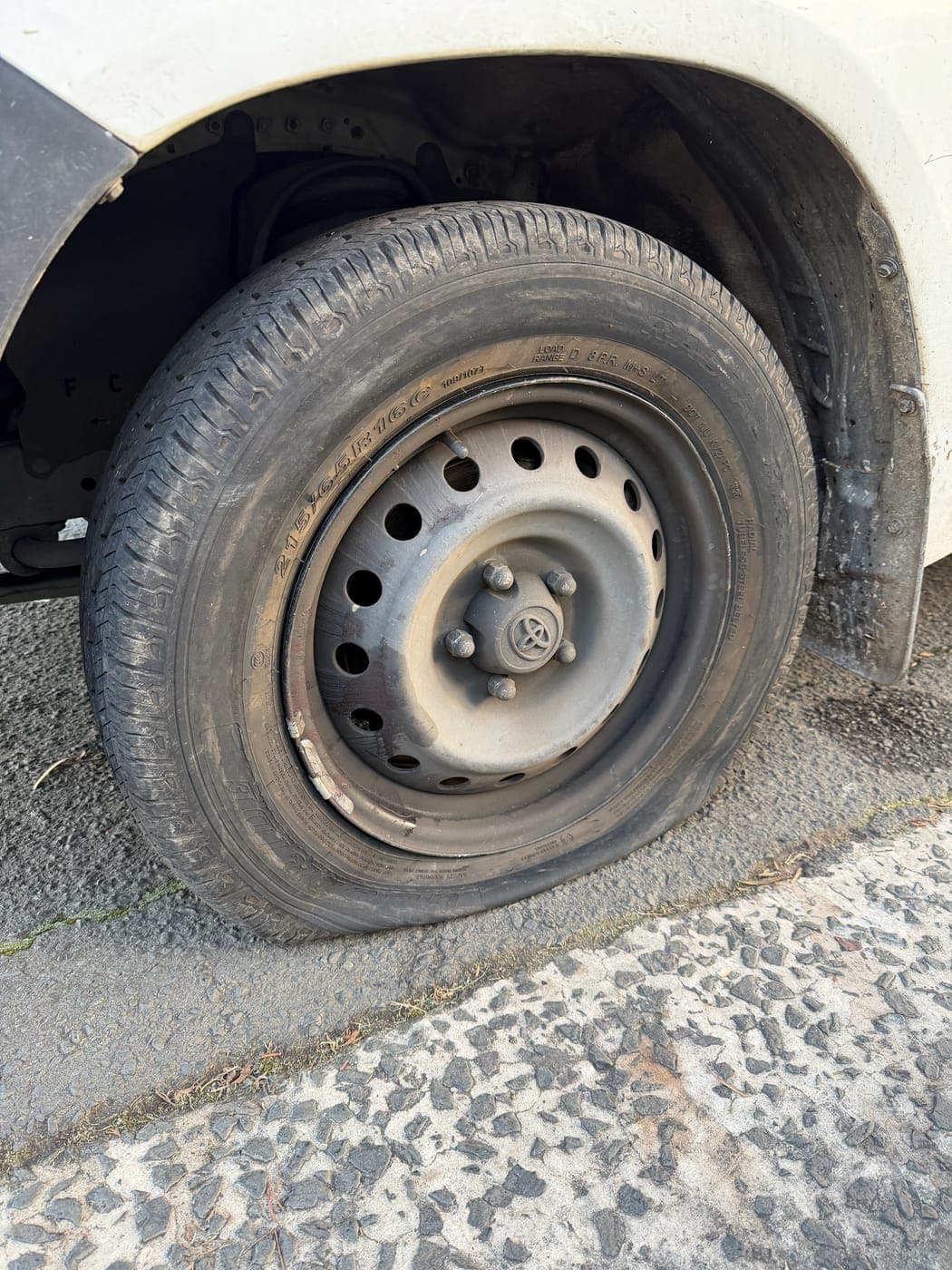 Toyota HiAce van tyre destroyed after being driven flat in Wollongong