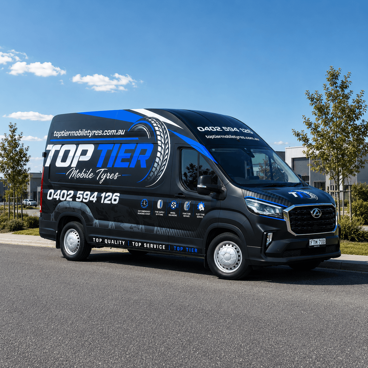 Top Tier Mobile Tyres branded service van parked in a residential street